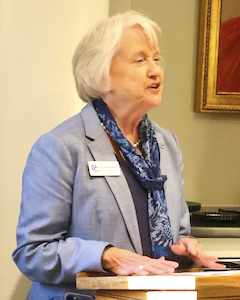 Presbyterian College president Dr. Anita Gustafson announces the reopening of the Bailey Gallery in Neville Hall and the dedication of the Vance Plaza.